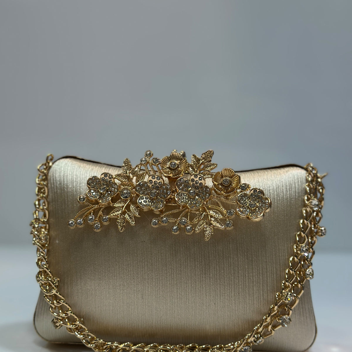 Back view of the rhinestone flower clasp clutch