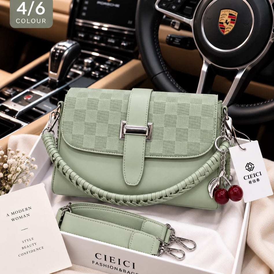 Braided strap detail on a checkered crossbody bag