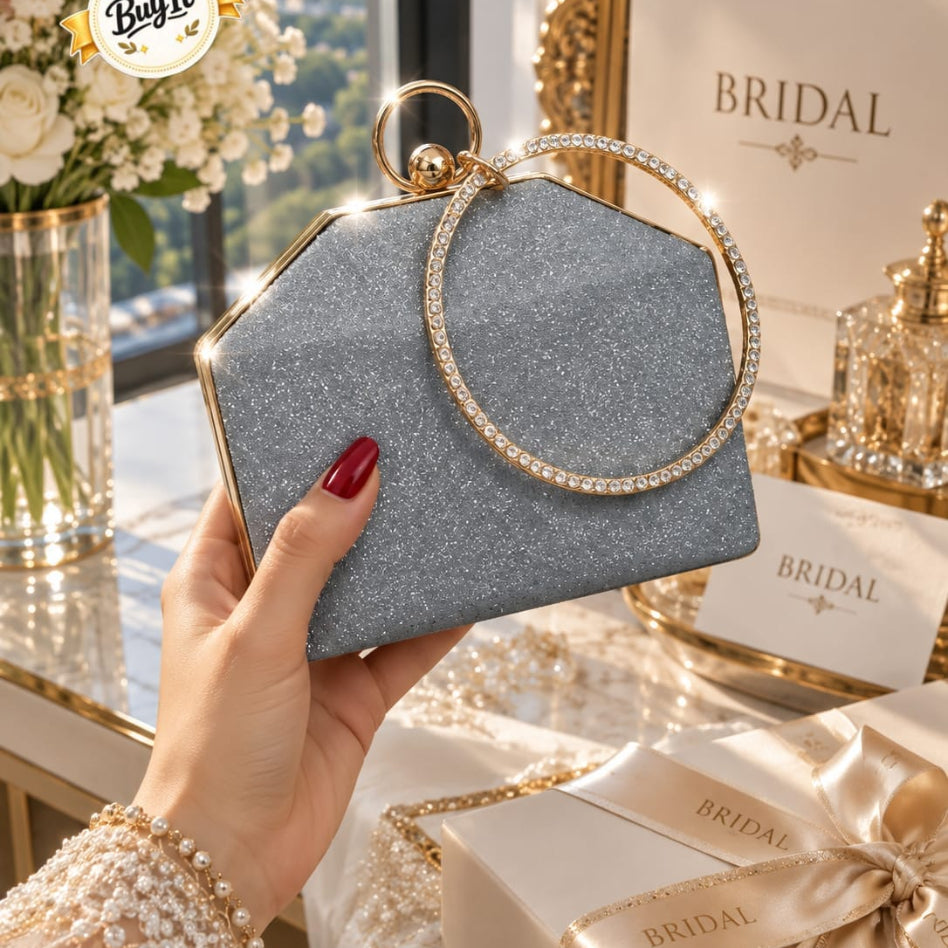 Bridal party wear wristlet clutch with sparkling finish and diamond ring handle