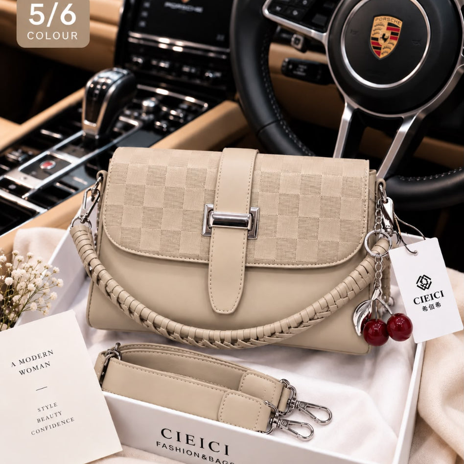 Close-up of the checkered pattern on a women's crossbody bag
