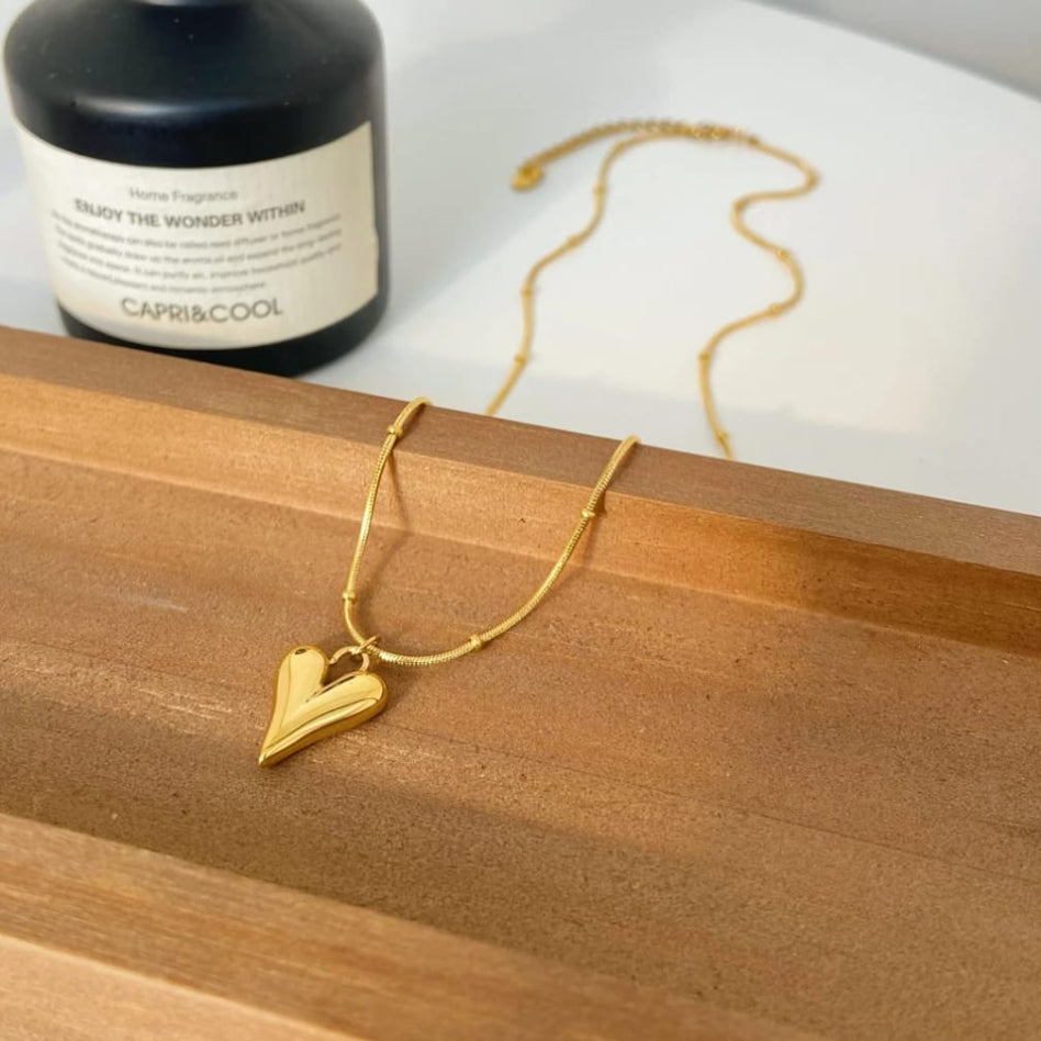 Dainty puffy heart pendant necklace with beaded chain detail for women | Rivaalane