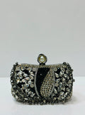 Elegant crystal embellished bridal clutch with pearl clasp