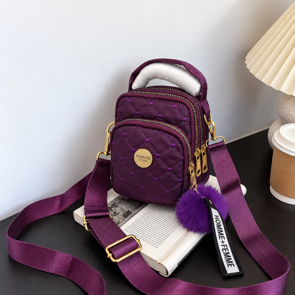 Fashionable quilted backpack with gold hardware