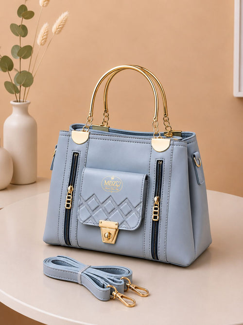Fashionable structured satchel with long shoulder strap