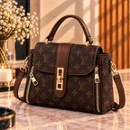 Fashionable structured women's handbag by Rivaalane