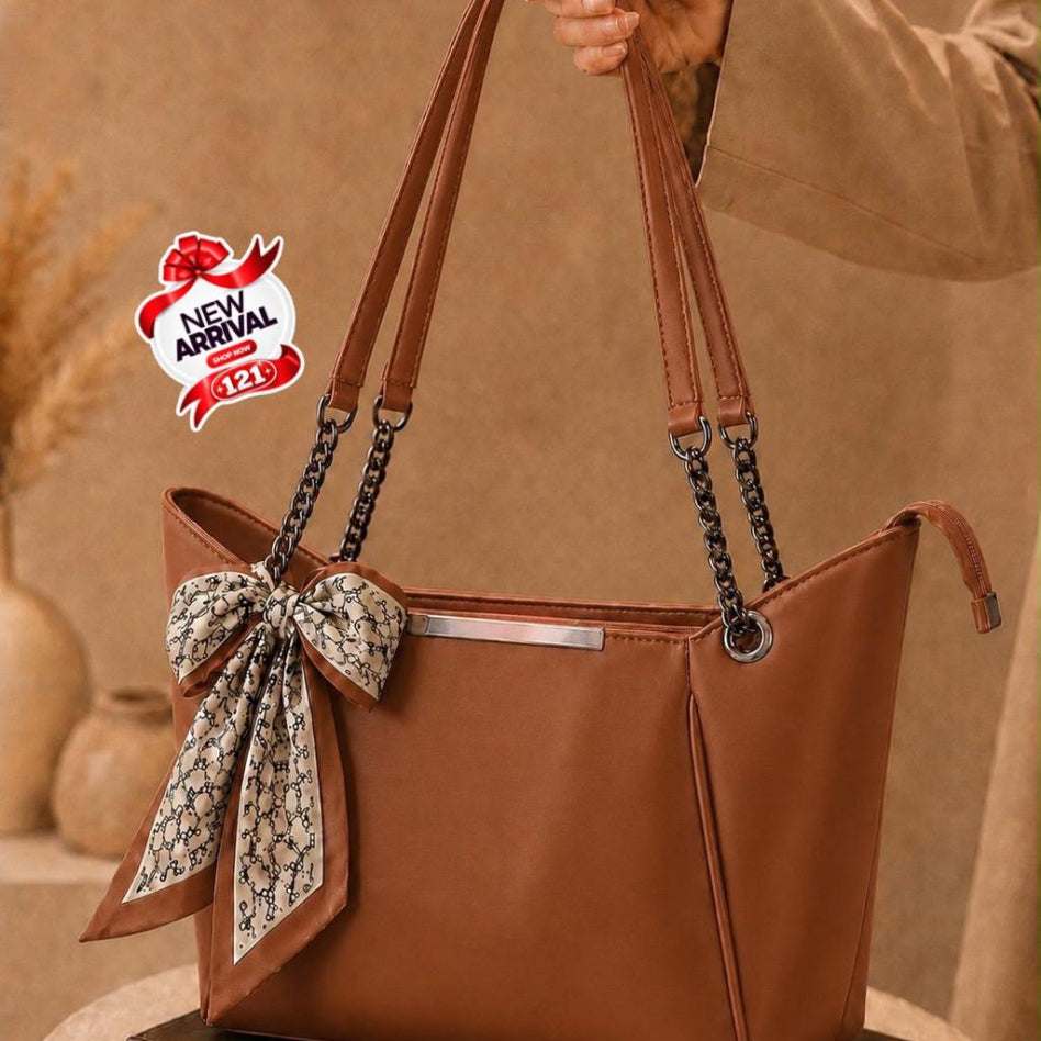 Fashionable women's handbag with scarf and chain straps