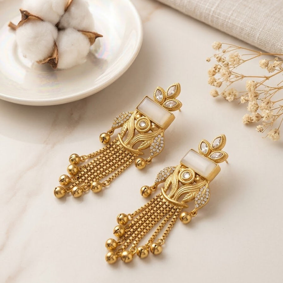 Kashmiri-inspired statement earrings with stone and ghungroo details