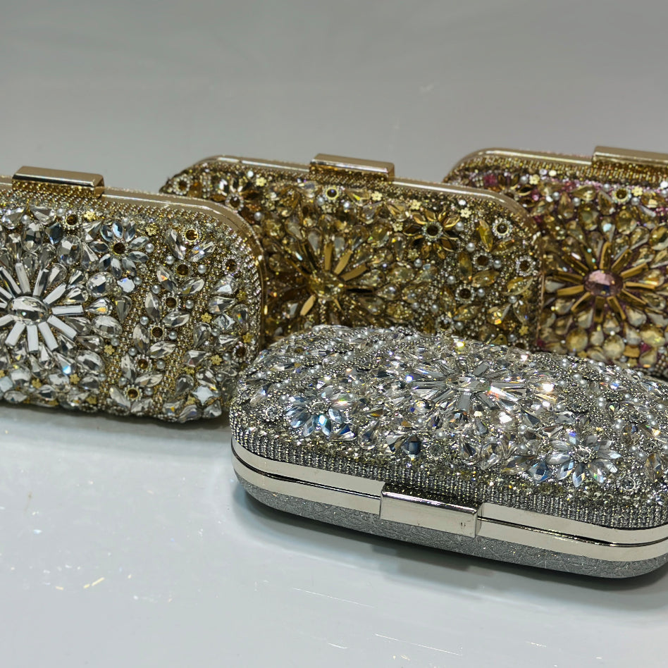 Luxury crystal rhinestone embellished floral party clutch by Rivaalane