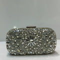 Luxury crystal rhinestone embellished floral party clutch by Rivaalane