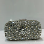 Luxury crystal rhinestone embellished floral party clutch by Rivaalane