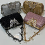 Luxury shimmer party clutch bag for women with crystal butterfly detail