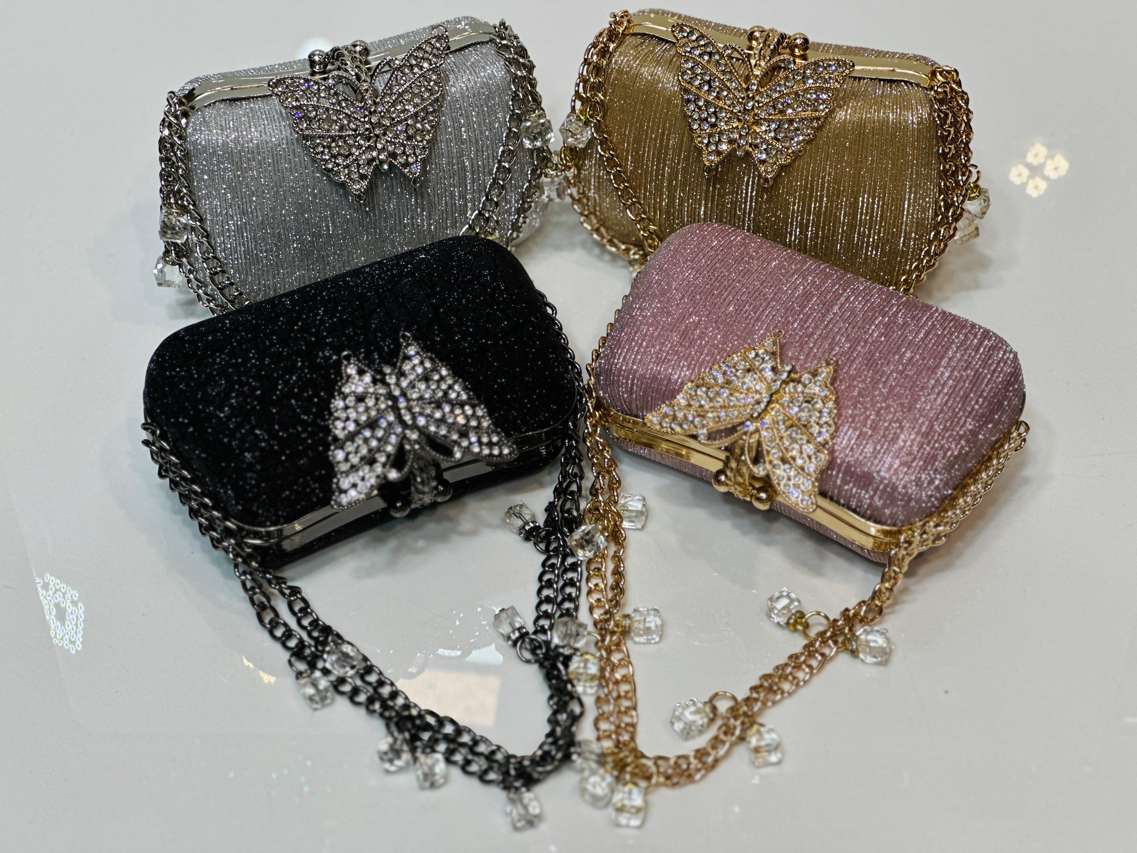 Luxury shimmer party clutch bag for women with crystal butterfly detail