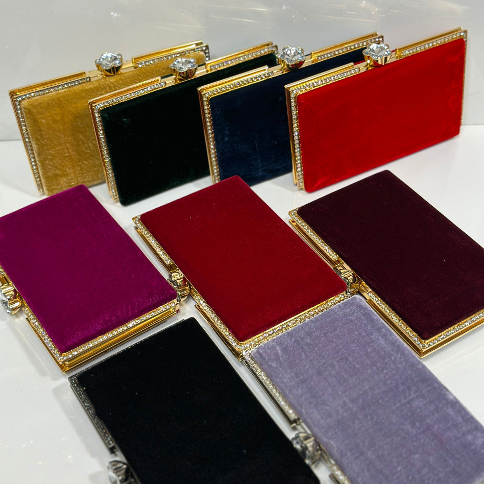 Luxury women's formal velvet purse with rhinestone trim detailing