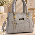 Marbled pattern satchel bag with letter charm and gold hardware