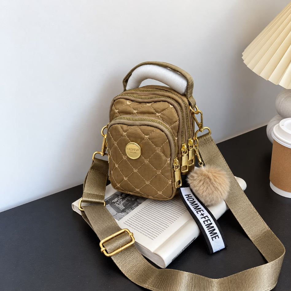 Modern women's backpack with gold-tone details