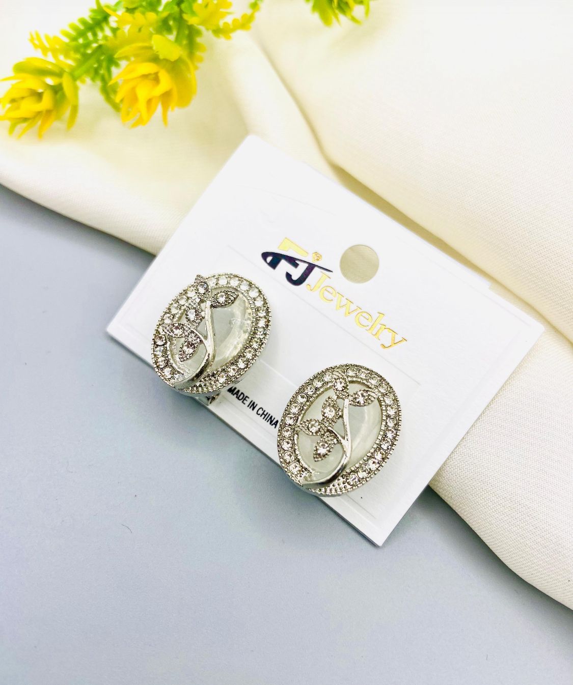Oval crystal statement stud earrings for women