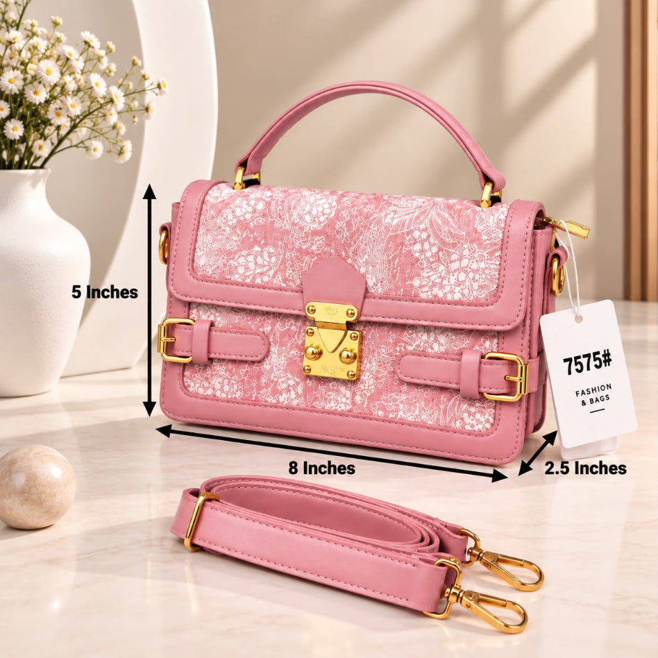 Pink handbag with a floral patterned front flap, gold-tone hardware