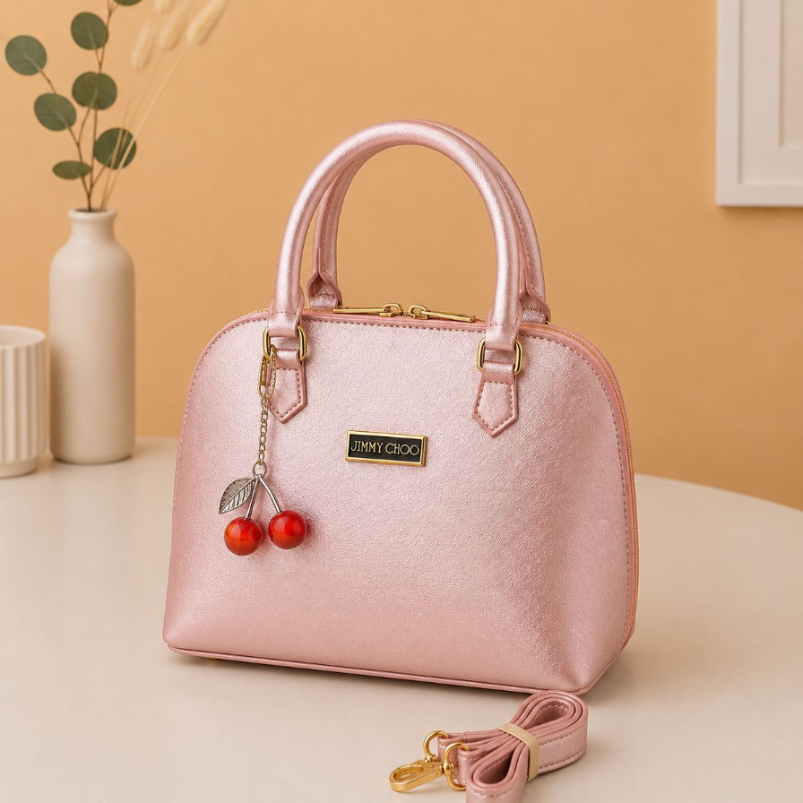 Light pink metallic top handle crossbody handbag