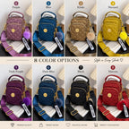Quilted casual backpack with top handle and gold hardware