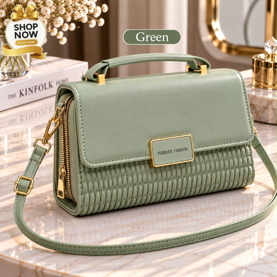 Quilted women's handbag with gold-tone hardware