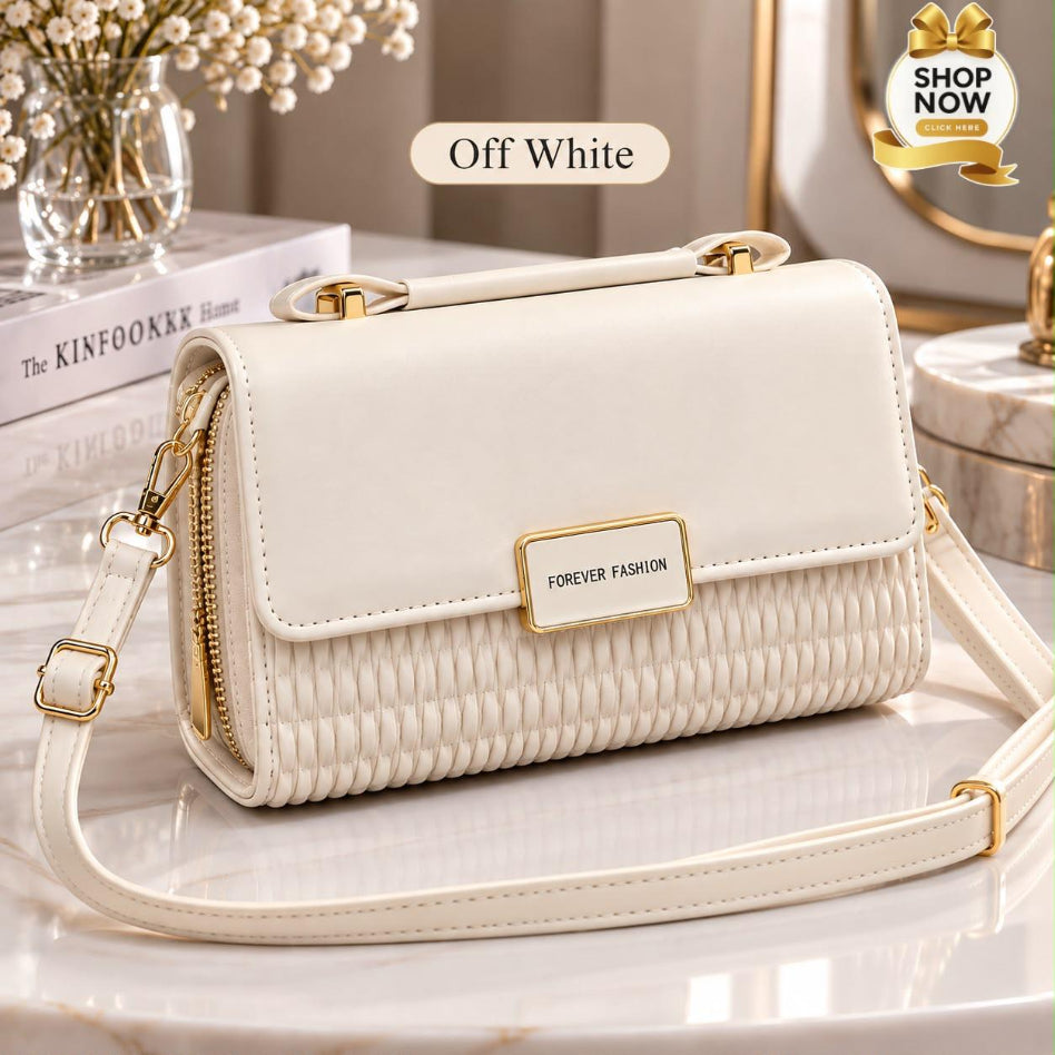 Rivaalane quilted crossbody handbag with gold hardware