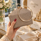 Rivaalane shimmering bridal clutch with diamond ring handle