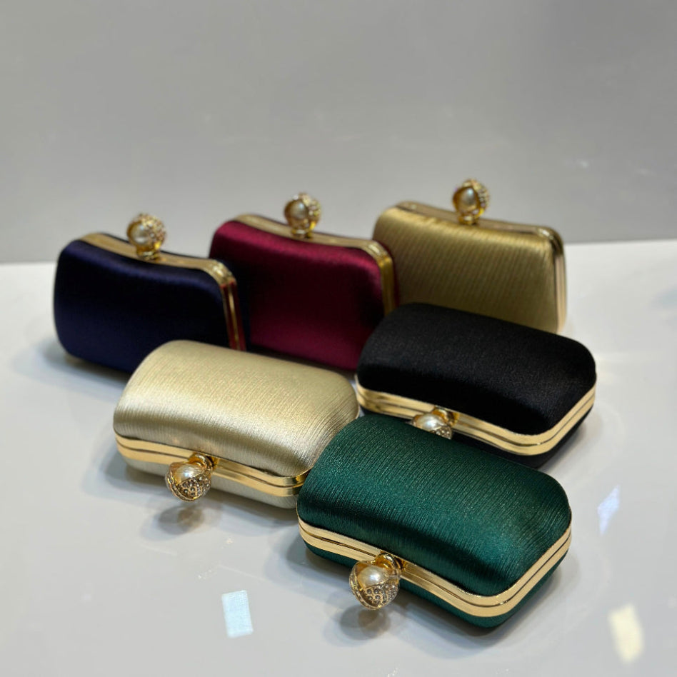 Silk textured hard case clutch bag for women with pearl top lock