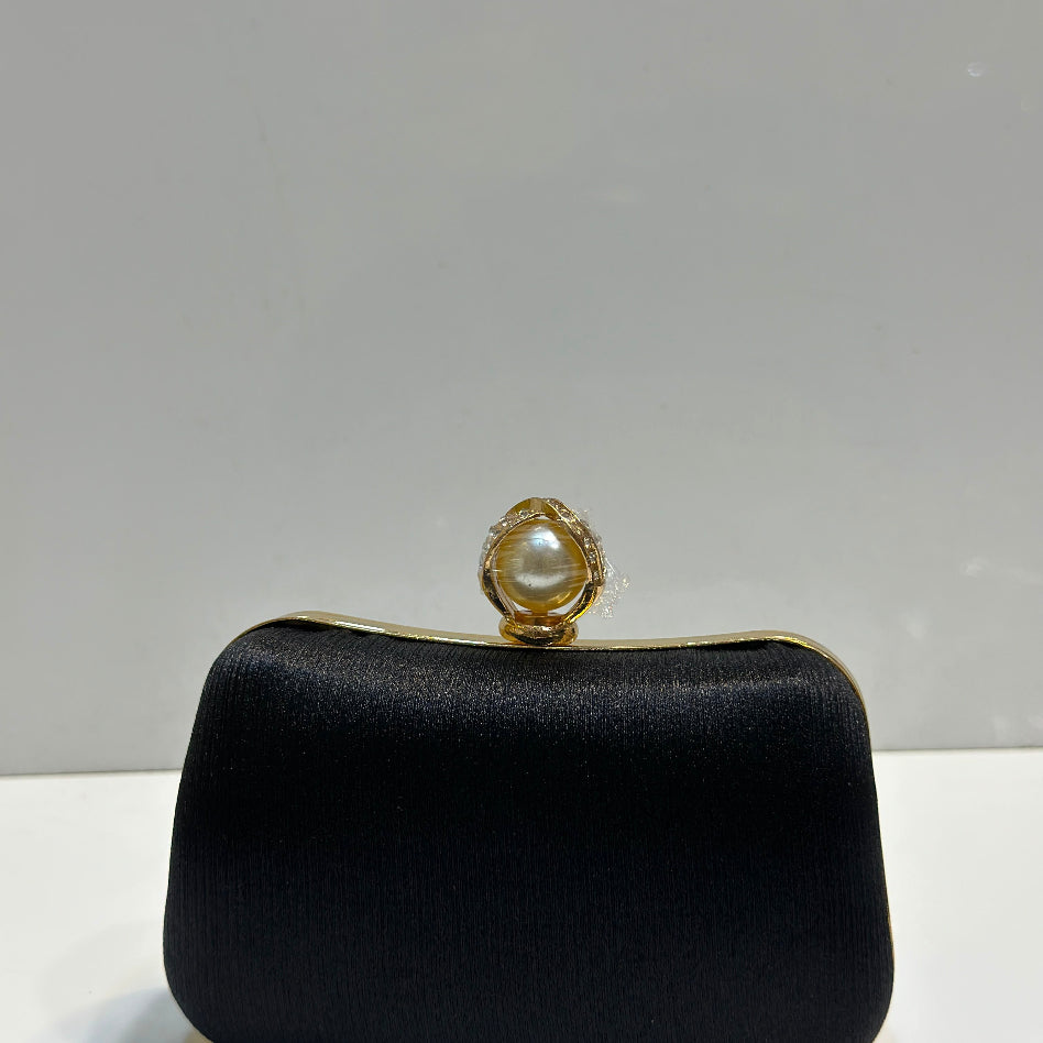 Silk textured hard case evening clutch purse with elegant pearl top lock