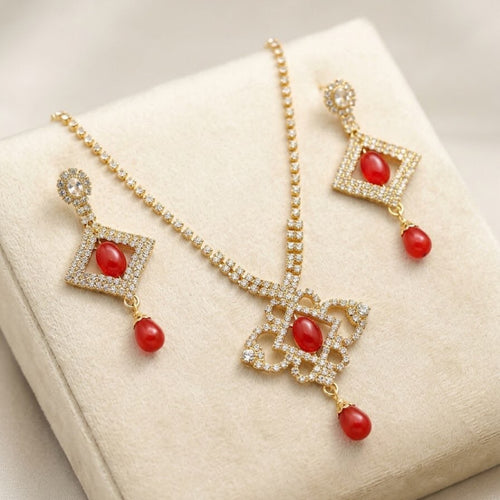 Sparkling pendant necklace with matching crystal earrings