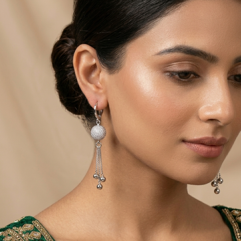 Sparkly silver sphere earrings for women with huggie hoop closure
