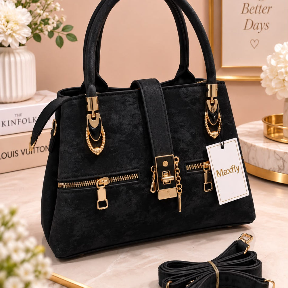 Stylish women's handbag with gold-tone hardware and structured design