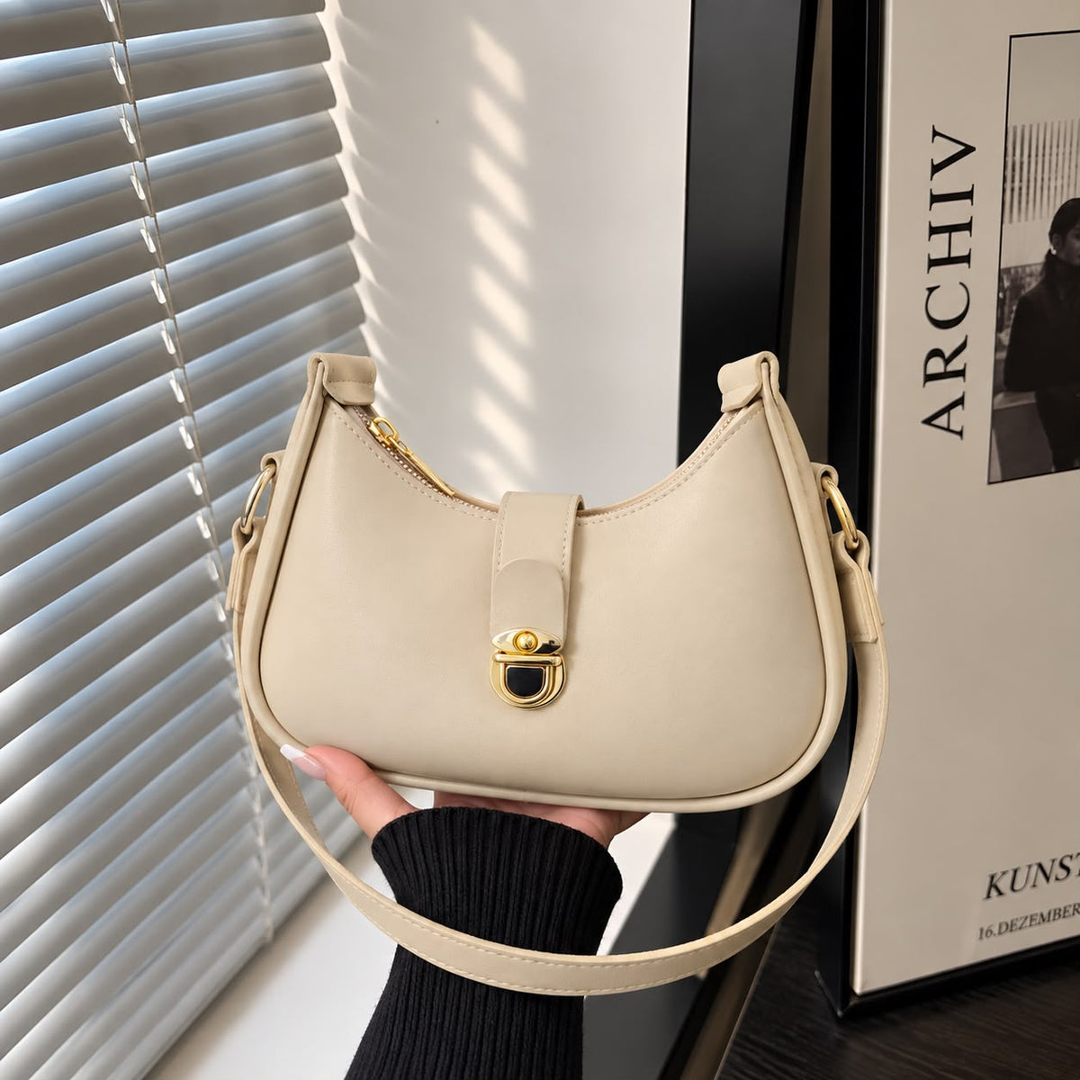 Curved Hobo Shoulder Bag with Front Lock & Gold Hardware | Rivaalane