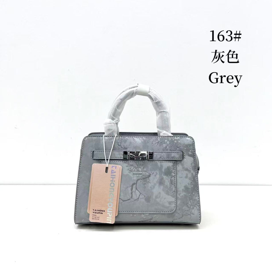 Women's floral printed structured handbag with top handles by Rivaalane