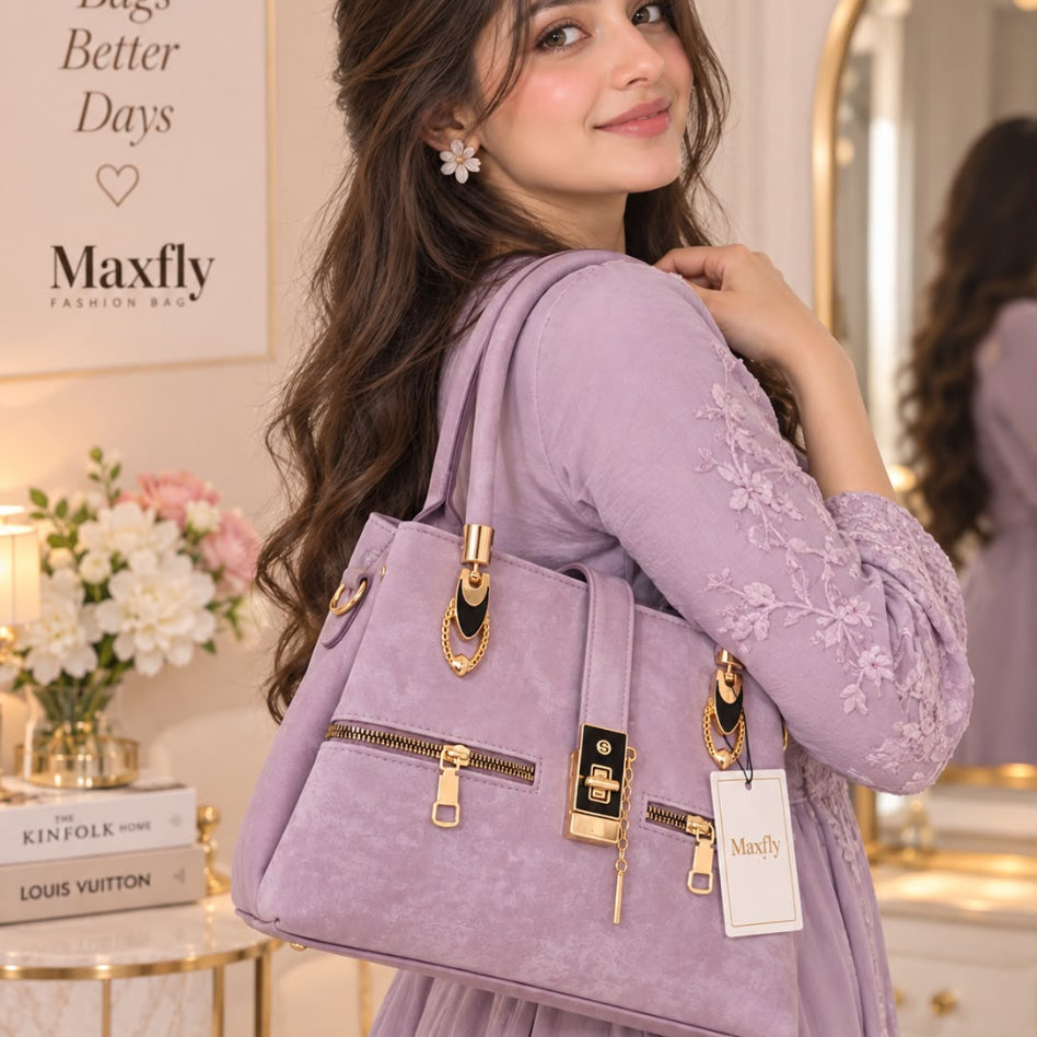 Women's structured purse with front zipper detailing