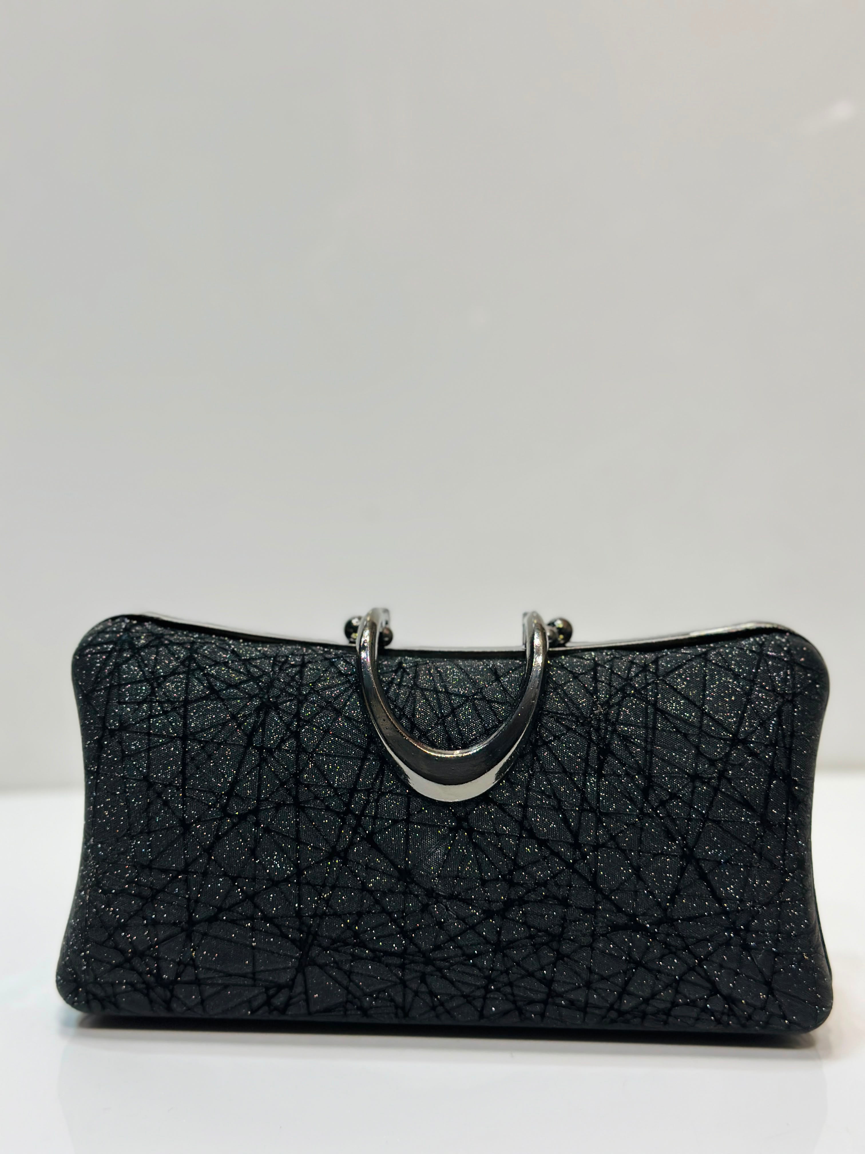 Glittery hard case clutch bag for women for weddings and evening parties