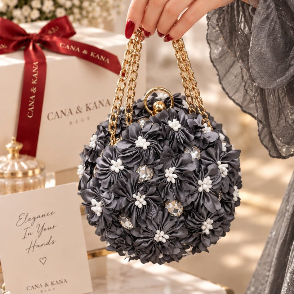 gray fabric flower purse with gold chain handles