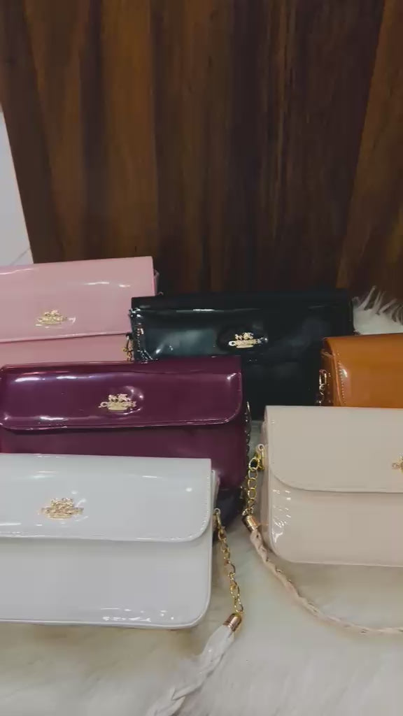 Women's glossy shoulder bag with elegant flap design