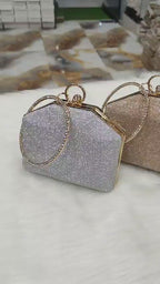 Bridal evening purse with sparkling finish and statement ring handle