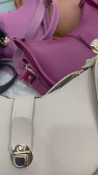 Stylish hobo shoulder bag with front lock detail