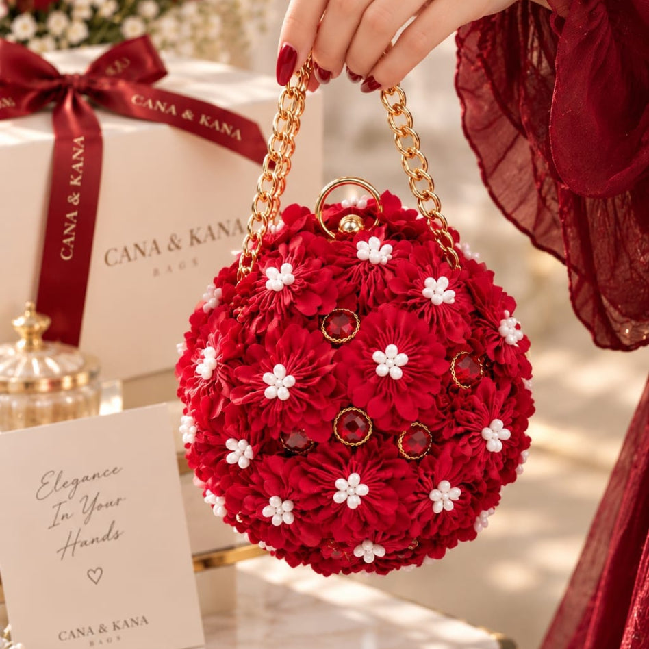 round red floral handbag with gold chain straps